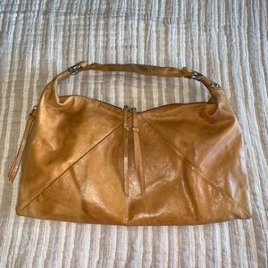 Hobo Brand Soft Leather Shoulder Bag W/ Tassels, Side Zip Pocket & Cloth Lined.